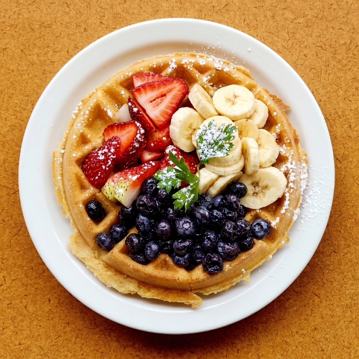 Belgian Waffles with Strawberries, Blueberries and Bananas.