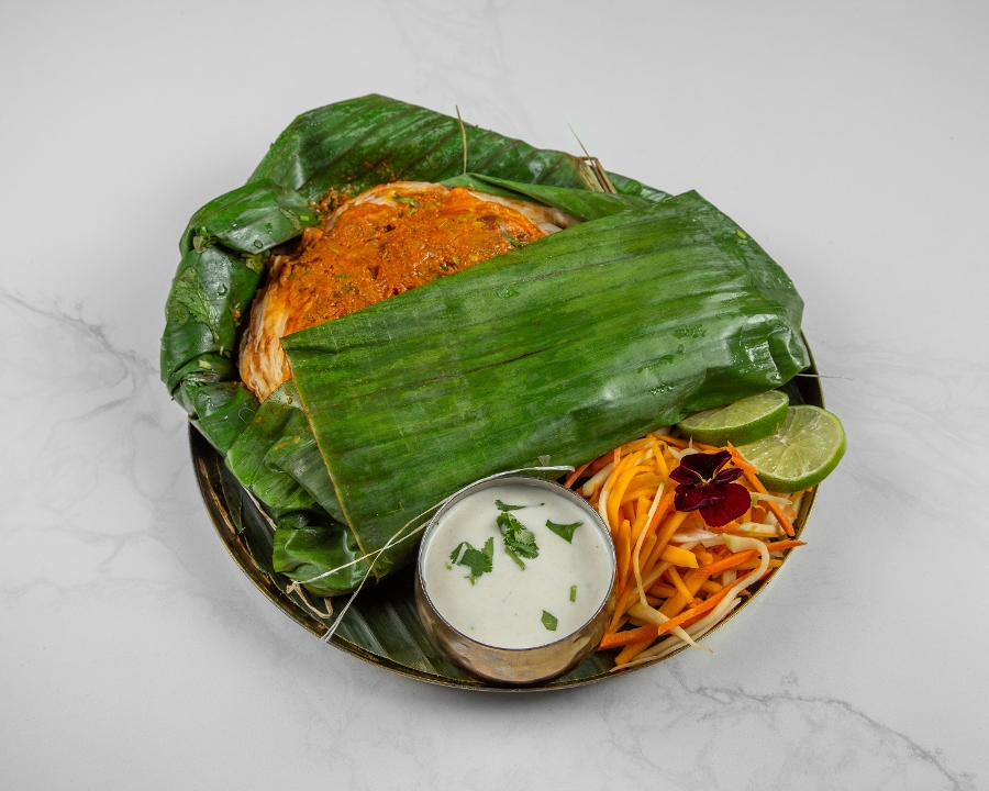Kizhi Parotta Chicken.