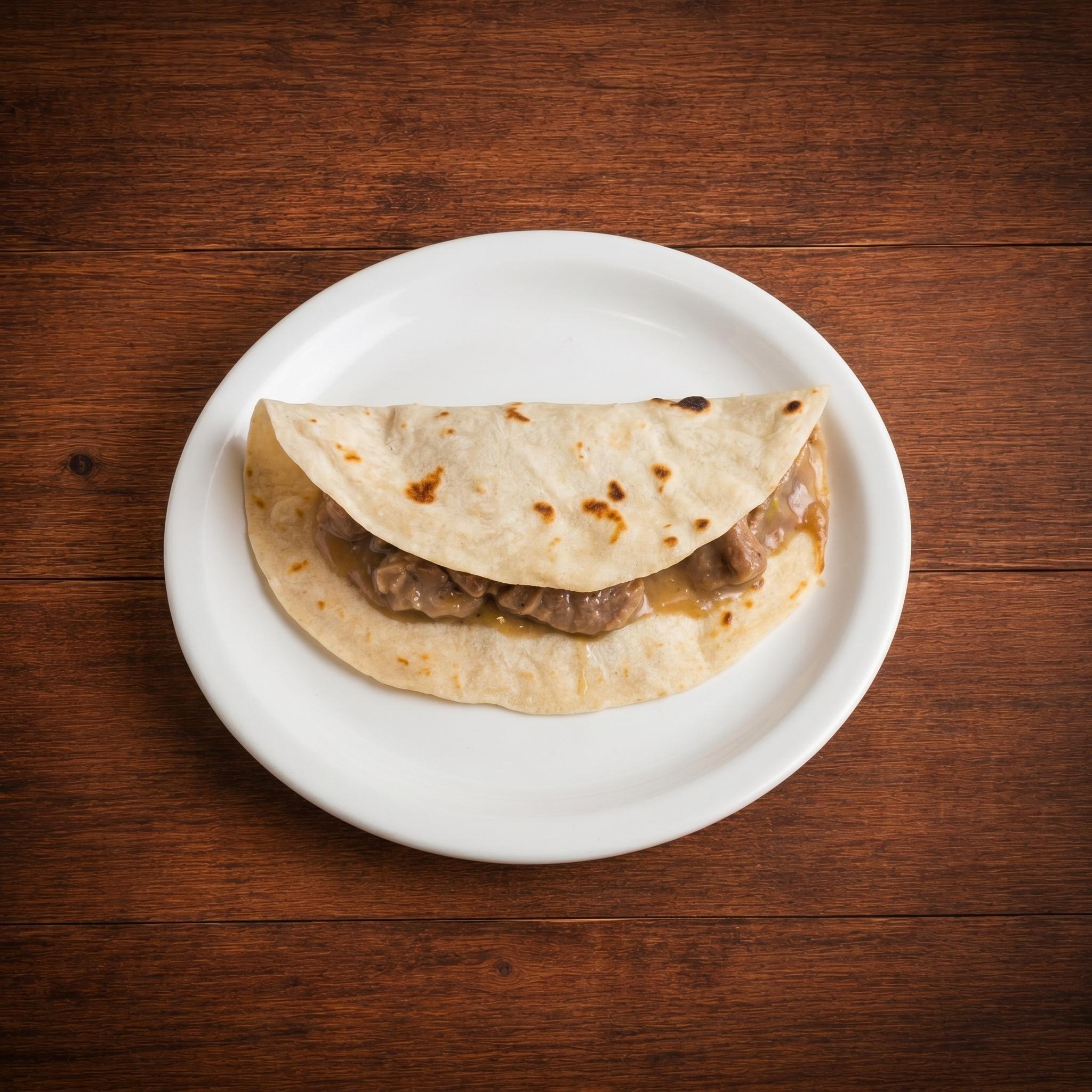 Carne guisada taco.