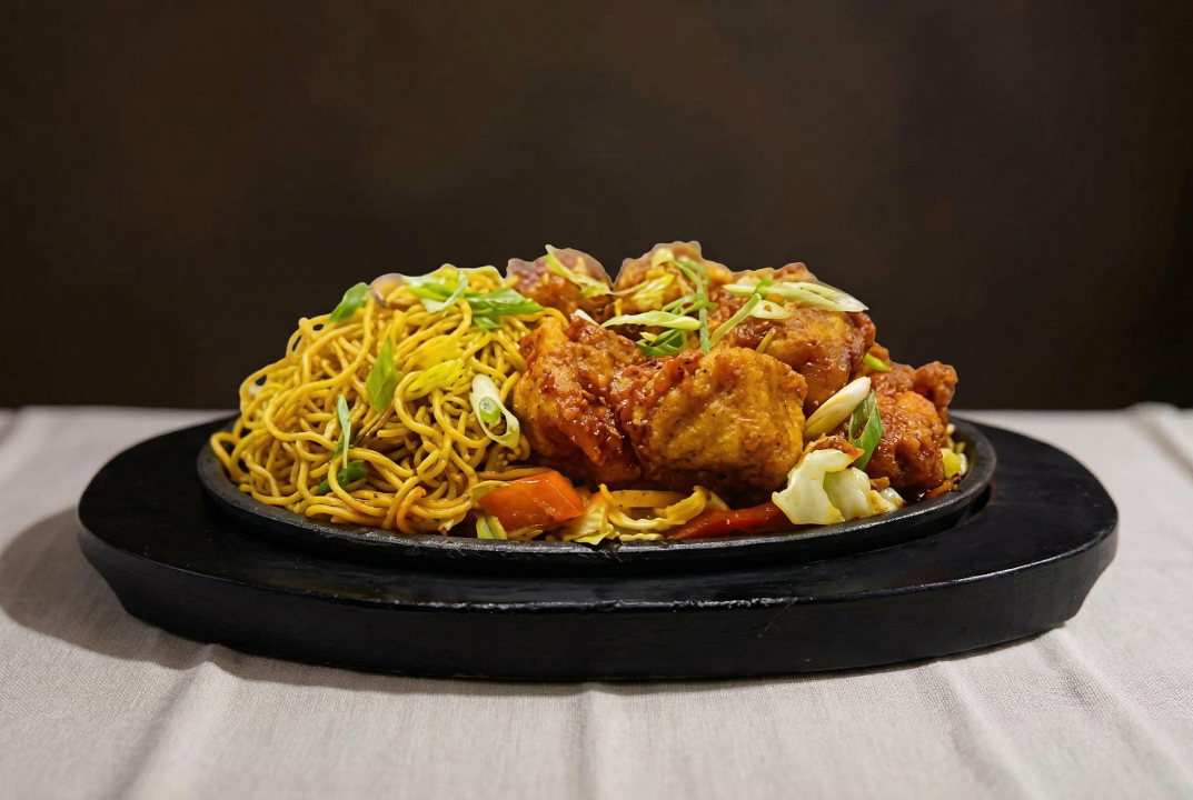 124. Sizzler (Chicken) Momo.