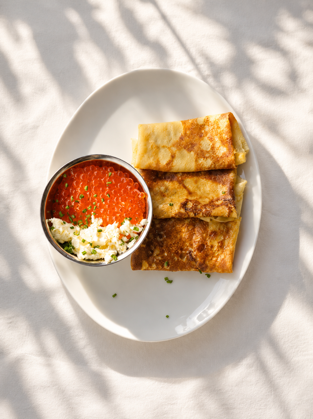 Crepes with Red Caviar, Butter and Dill.