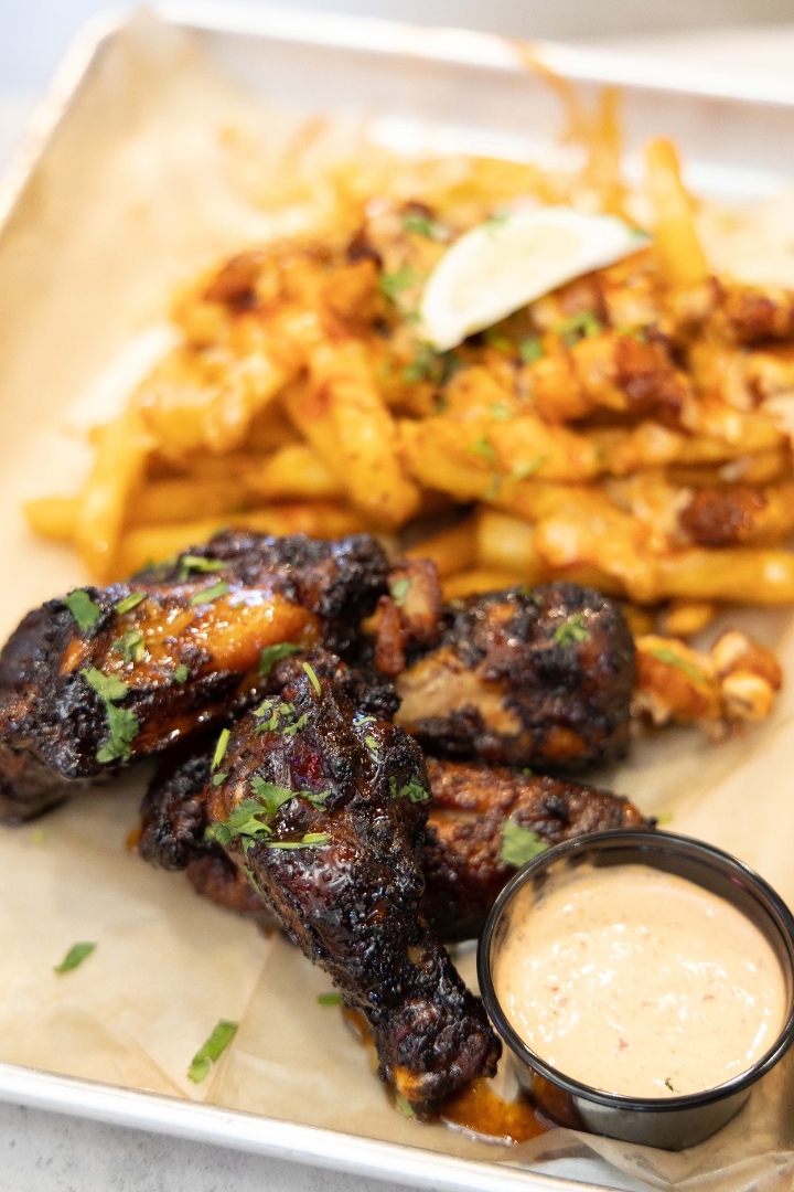 Tuesday - Smoked Chicken Wings and Seasoned Fries.