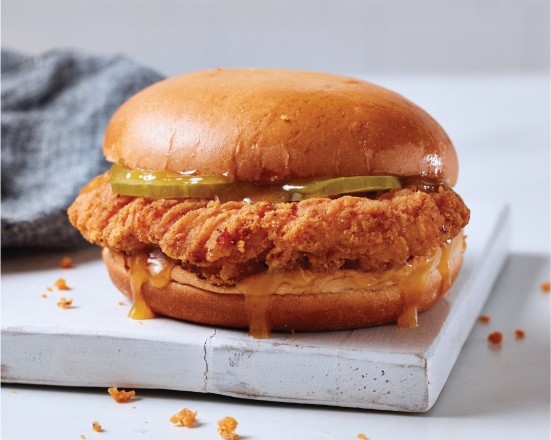 Halal Cajun Chicken Sandwich, regular fries, biscuit, and soda.
