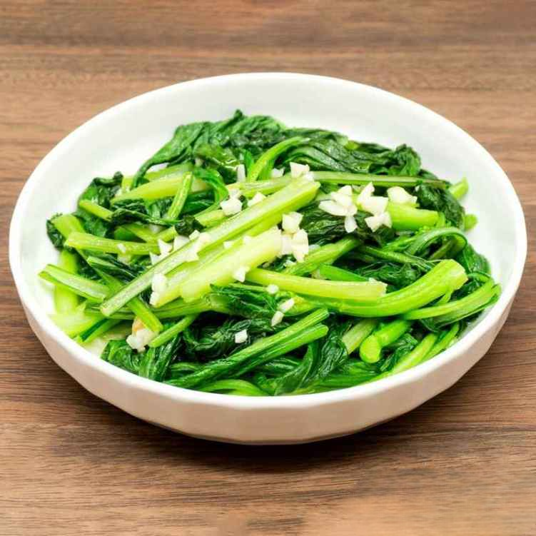 VG12. 蒜蓉炒菜心/Sauteed Yu Choy w. Minced Garlic.