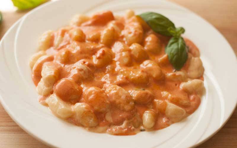 Vegan gnocchi pink sauce.
