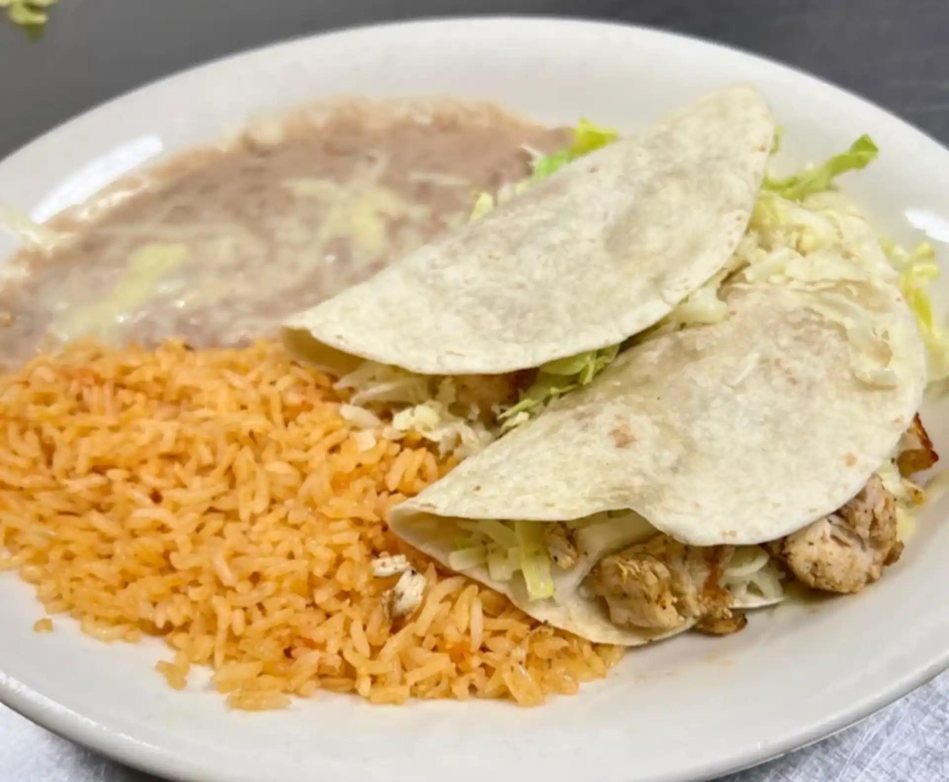 Two Tacos with Rice & Beans.