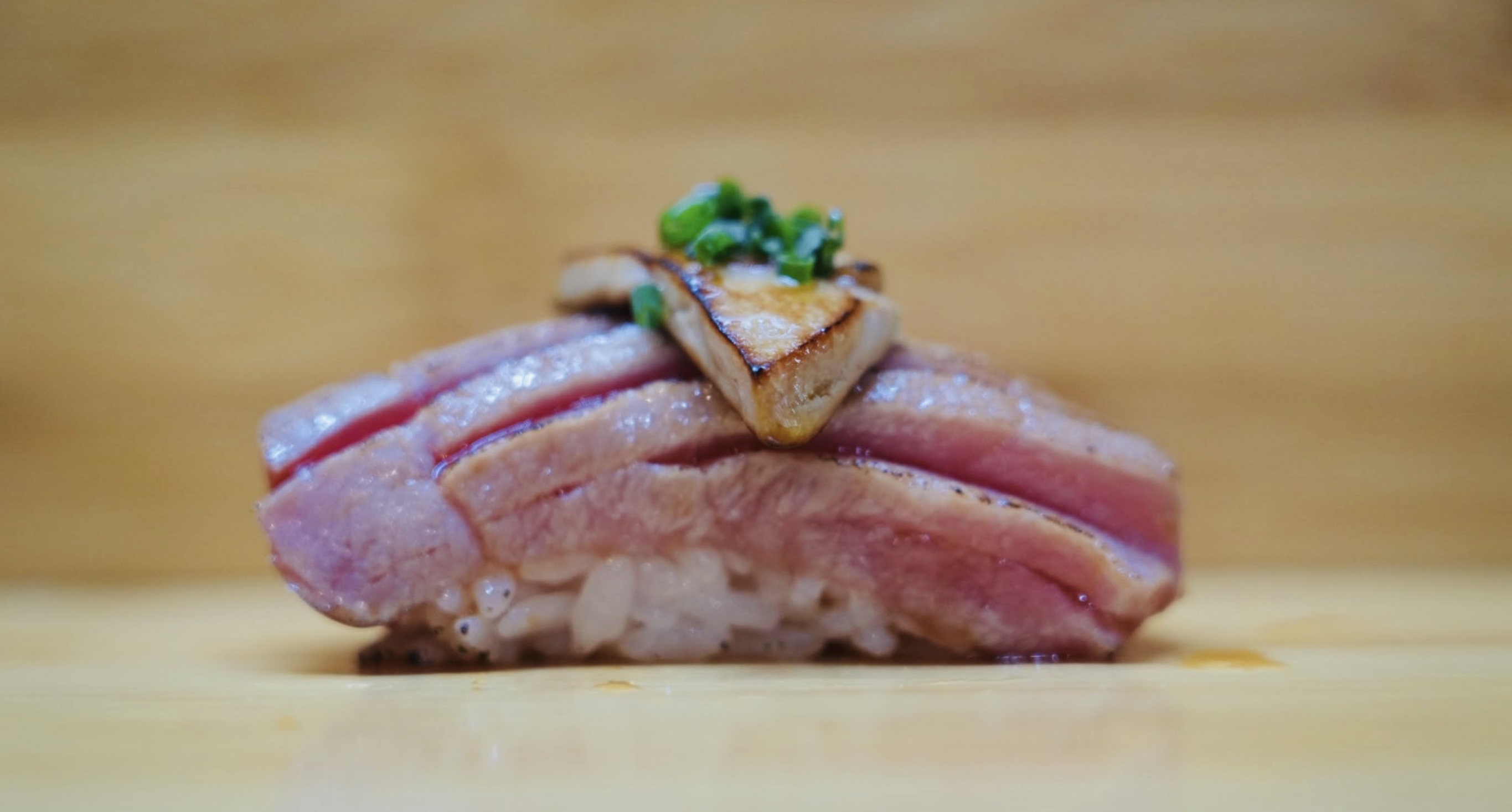 Seared O-Toro Foie Gras sushi.