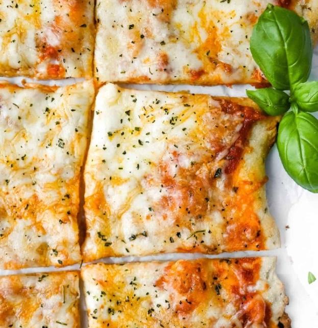 Tikka Delight Cheese Pizza.