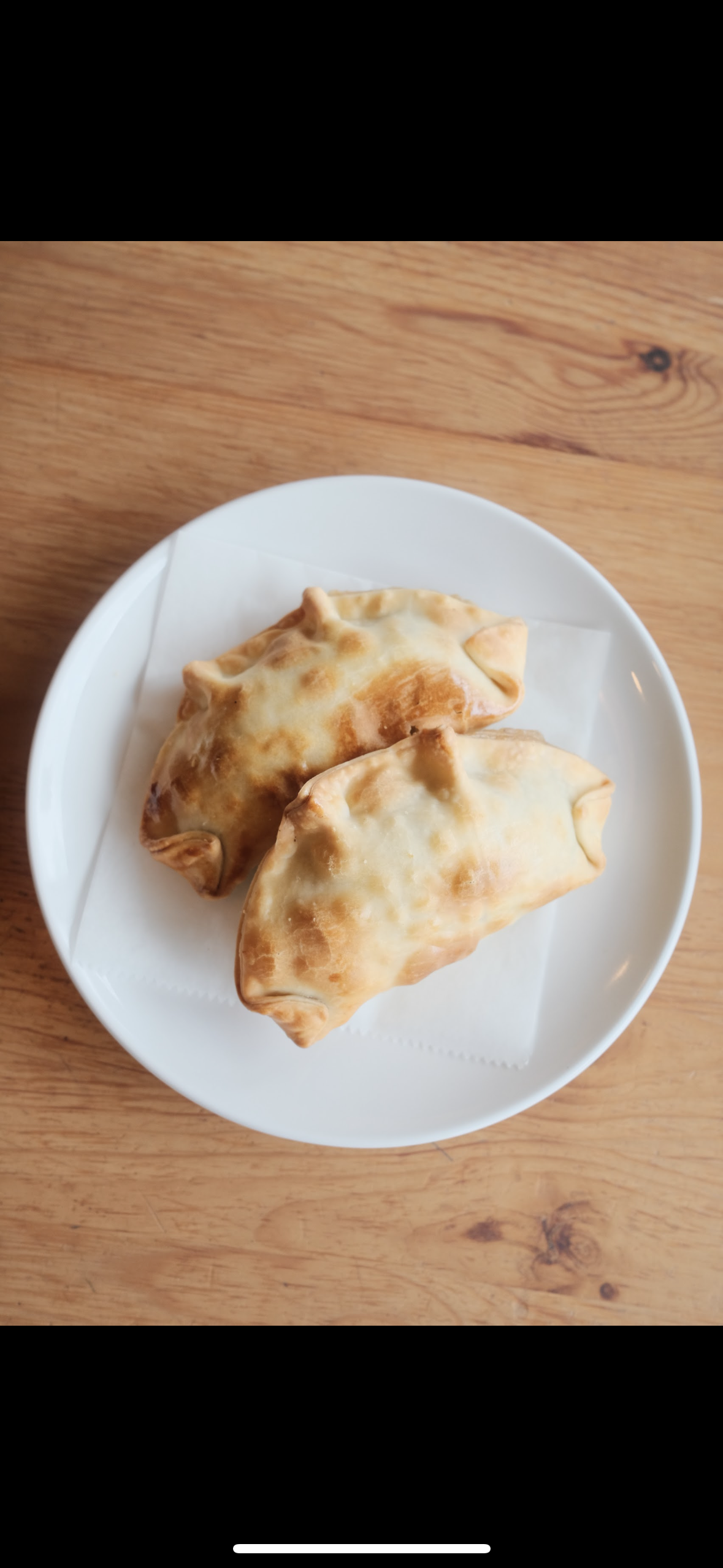 Premium Four Cheese Empanada.