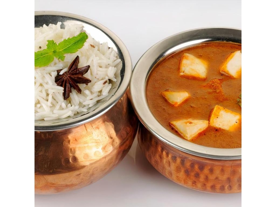 Paneer Butter Masala and White Rice.