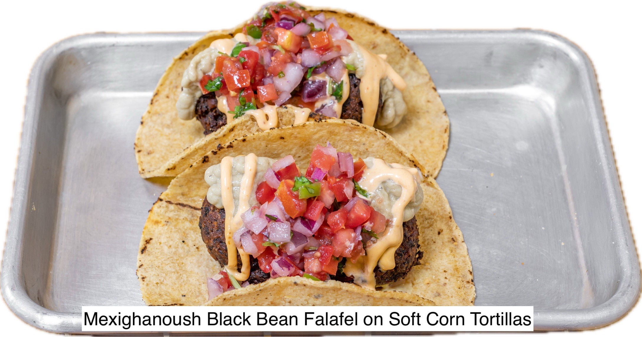 Mexiganoush Black Bean Falafel Tacos, babaghanoush, chipotle mayo, pico de gallo,.