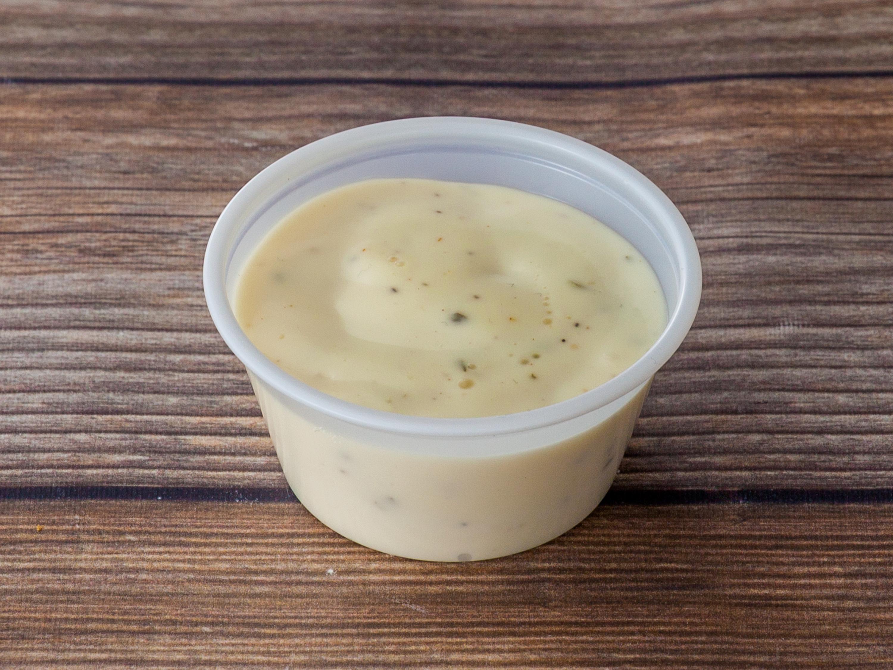 Cup of Ranch Sauce.