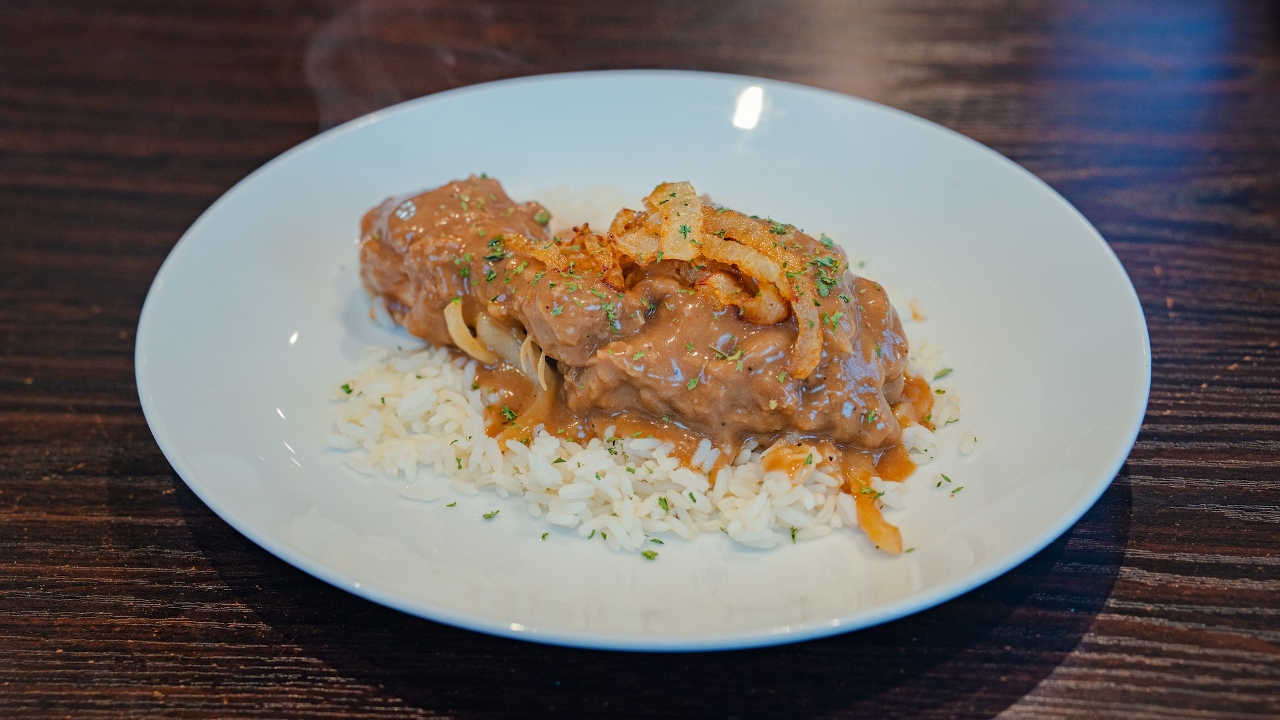 (2) SMOTHERED CHICKEN.