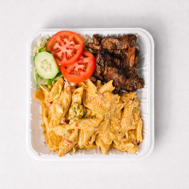Creole Pasta With Jerk Chicken.