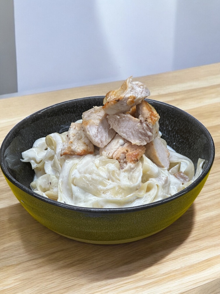 Chicken Alfredo (parm wheel twist).
