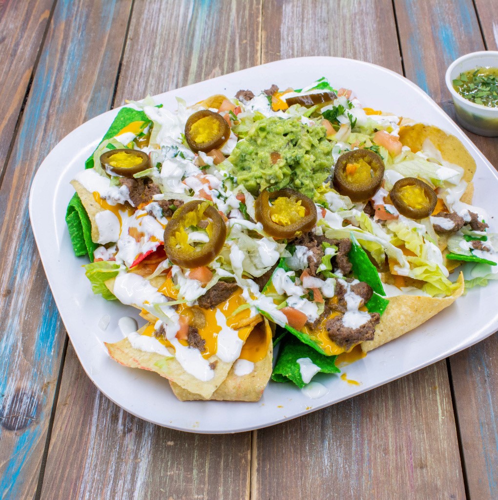 El Primo Special Super Deluxe Steak Nachos Cheese.