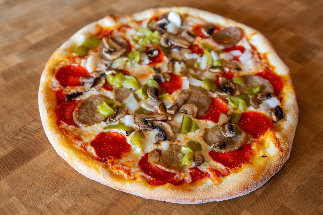 12" Extravaganza Pizza.