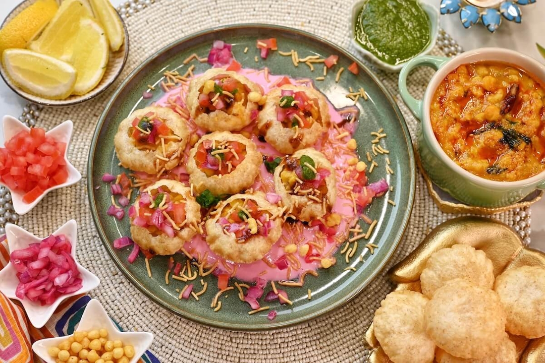 Chaat Medley (Dahi Puri, Aloo Tikki, Bhel Puri).