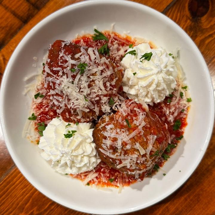 Jumbo meatballs and ricotta.