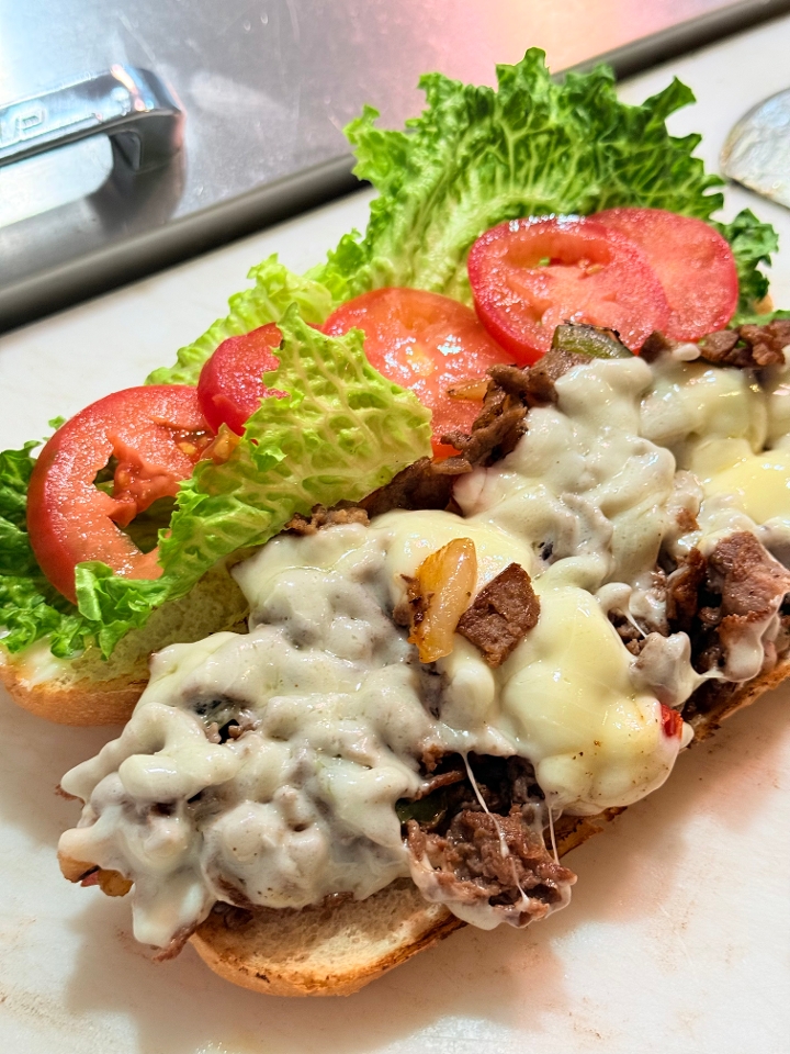 Steak & Cheese w/ Peppers & Onions.