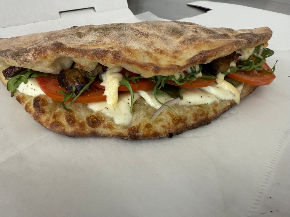 Ari's Special Pizza Sandwich.