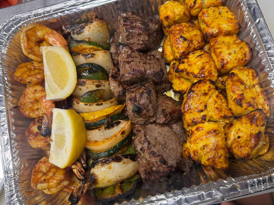 Chicken shrimp  & Steak kabob skewers.