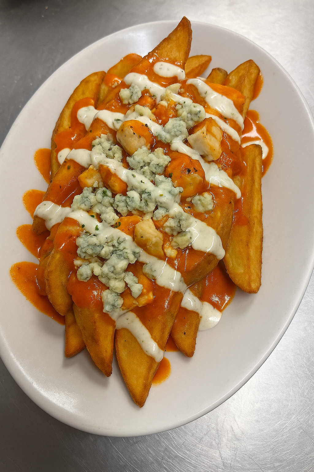 BUFFALO BLUE CHICKEN WEDGE FRIES.