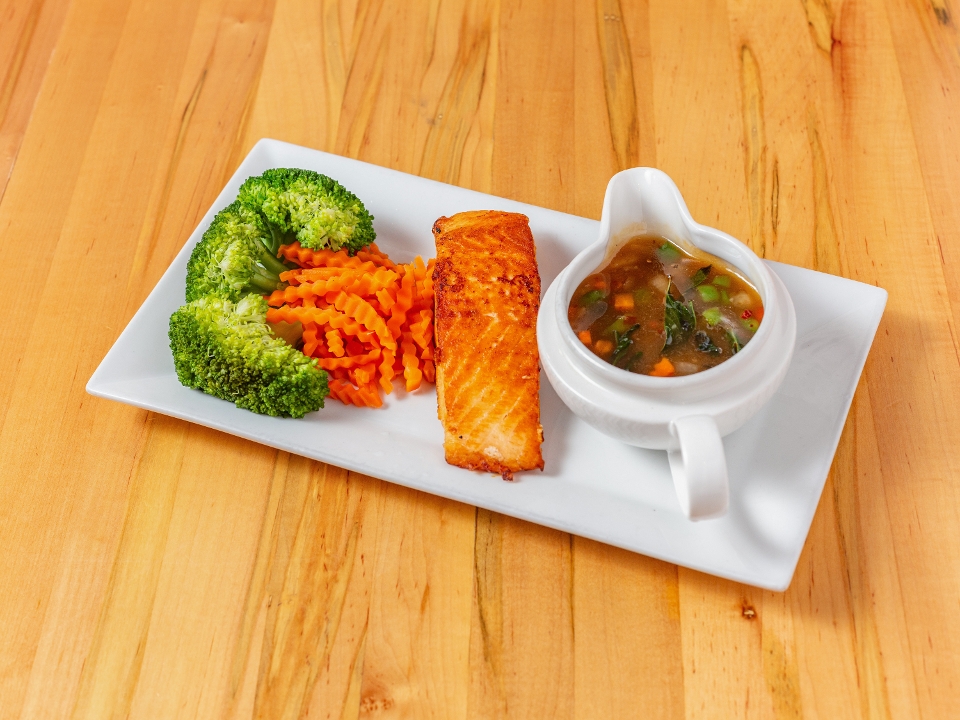 Grilled Salmon Steak with Basil Sauce.