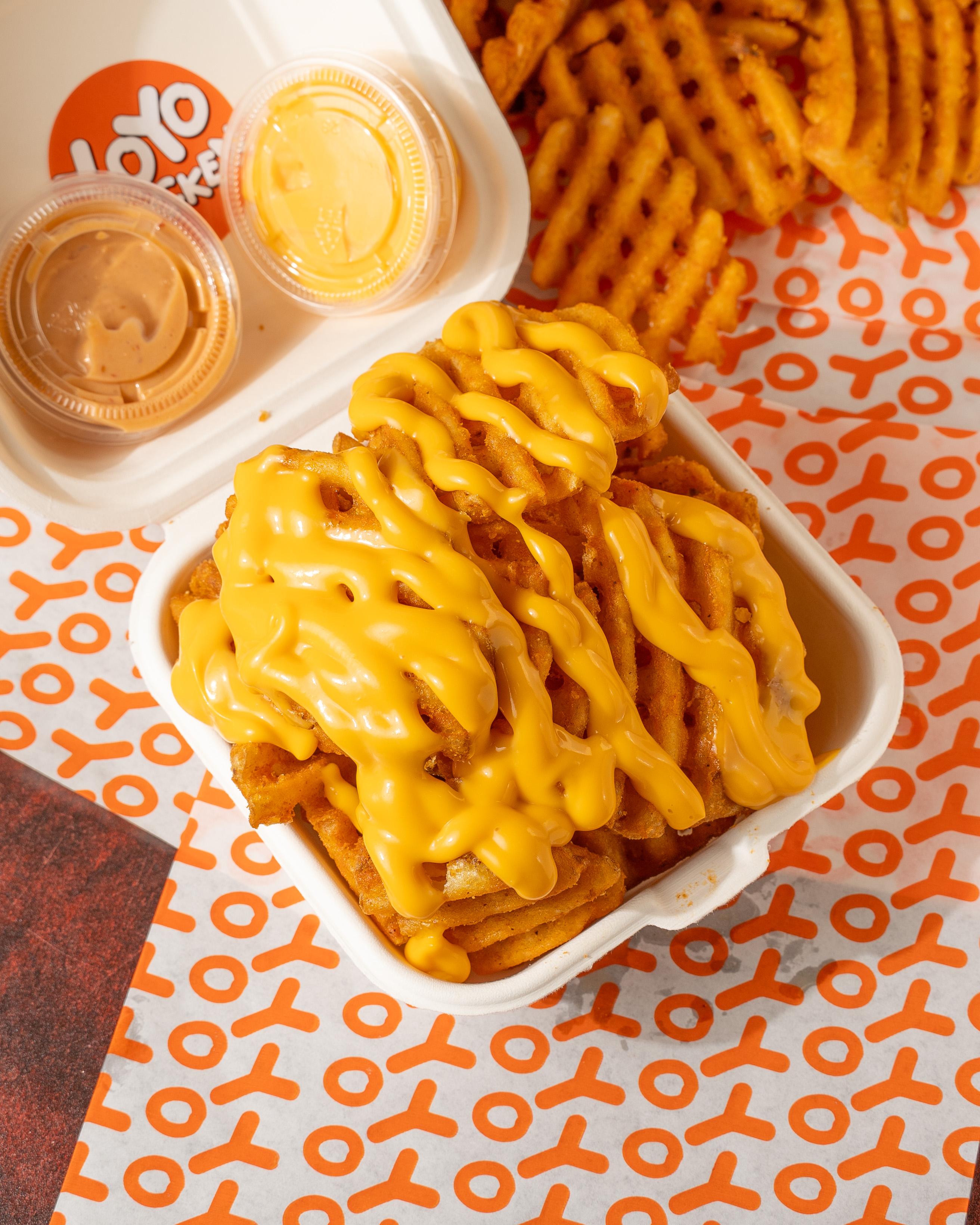 Waffle Fries Medium with cheese.