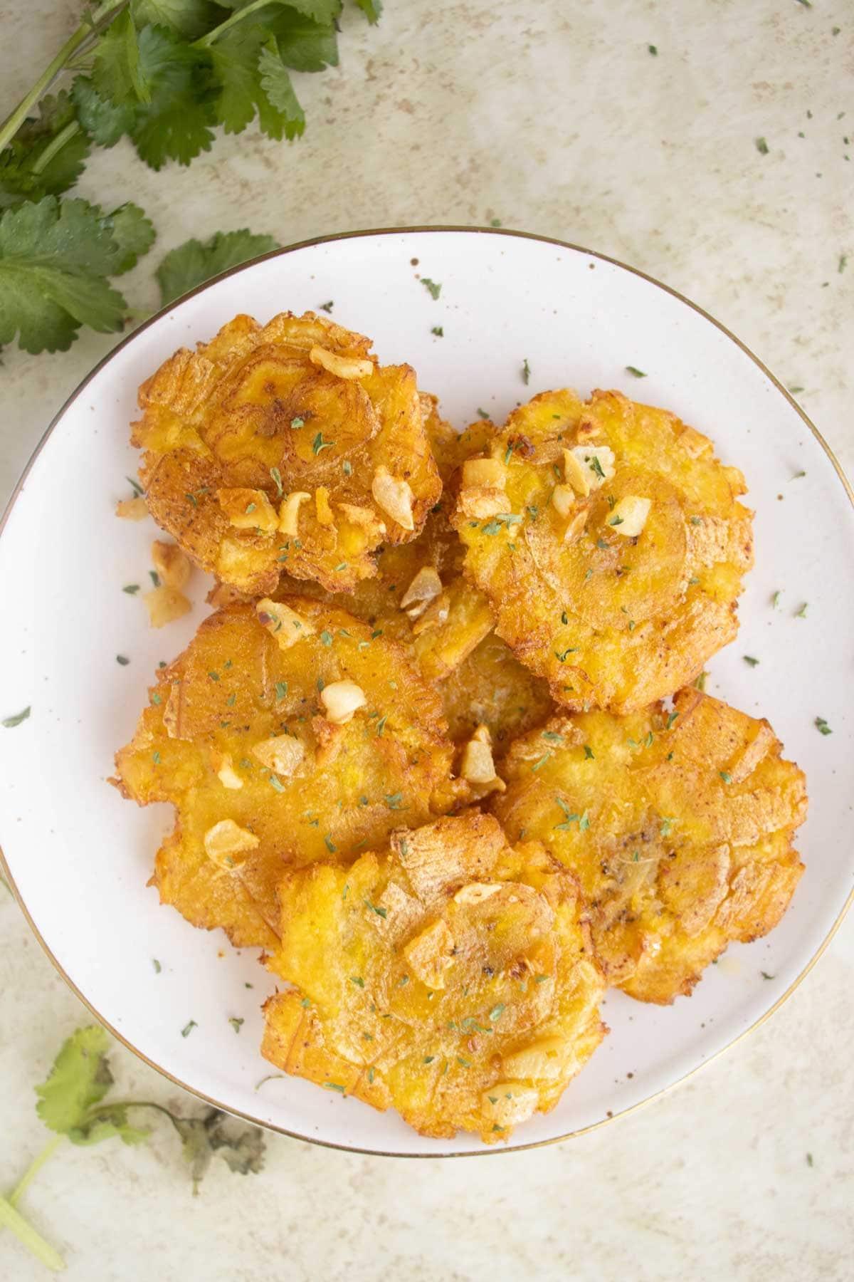 TOSTONES.