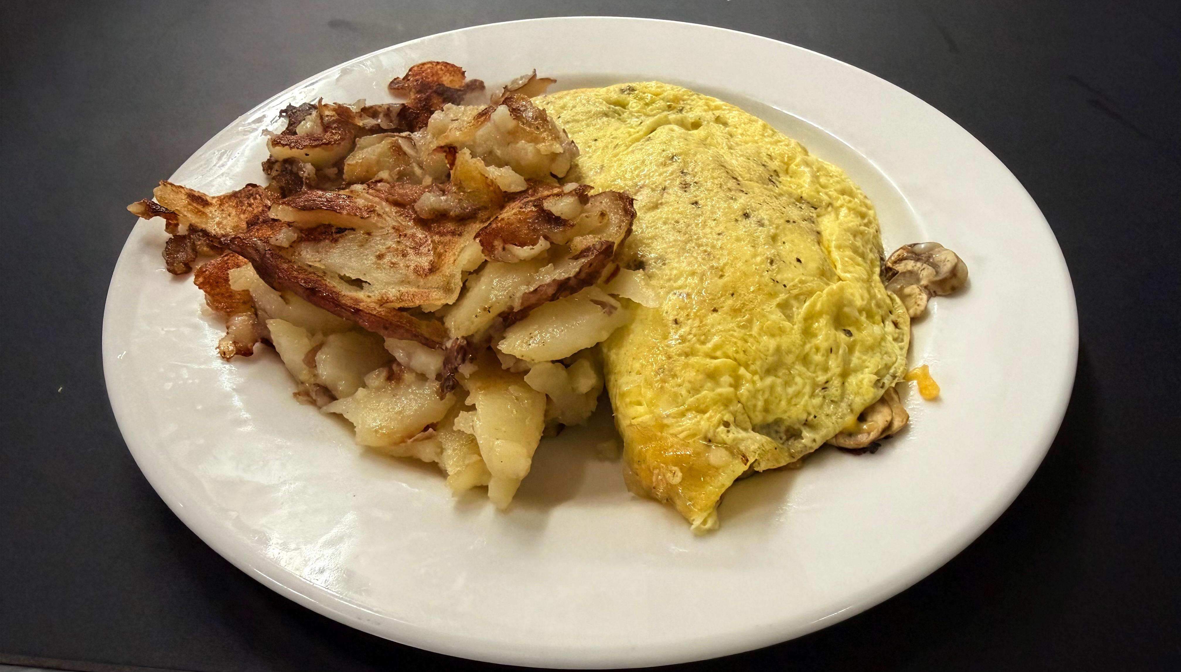Herb Mushroom and Cheese Omelette.