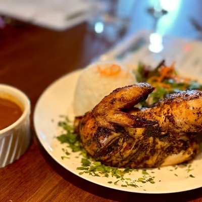 1/2 Pollo a la Brasa.
