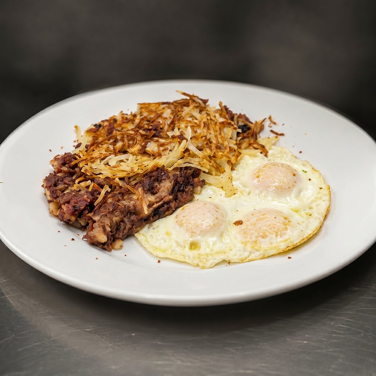 Corned Beef Hash & Three Eggs.