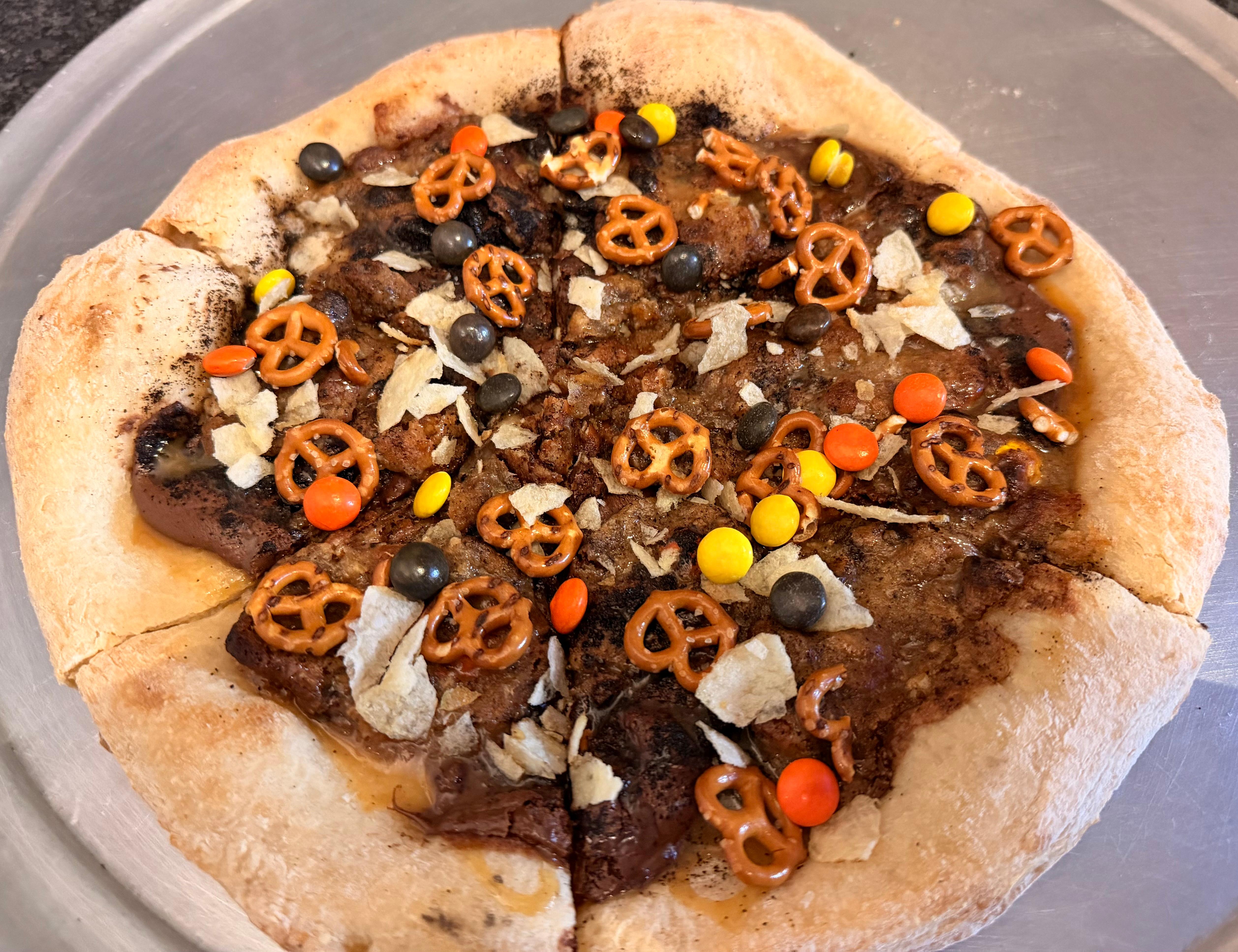 Everything But the Kitchen Sink Pizza.