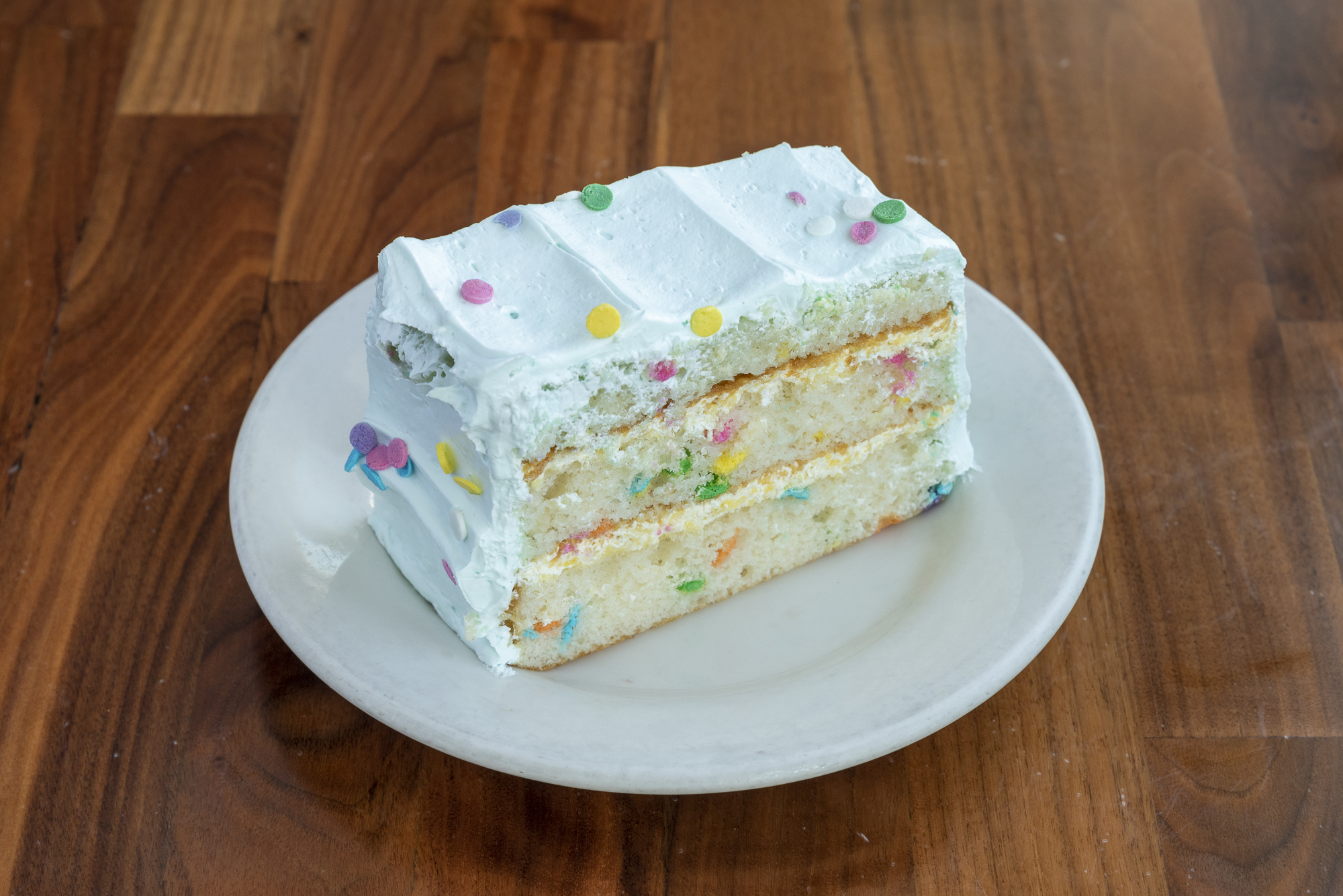 Celebration Cake (white), slice.