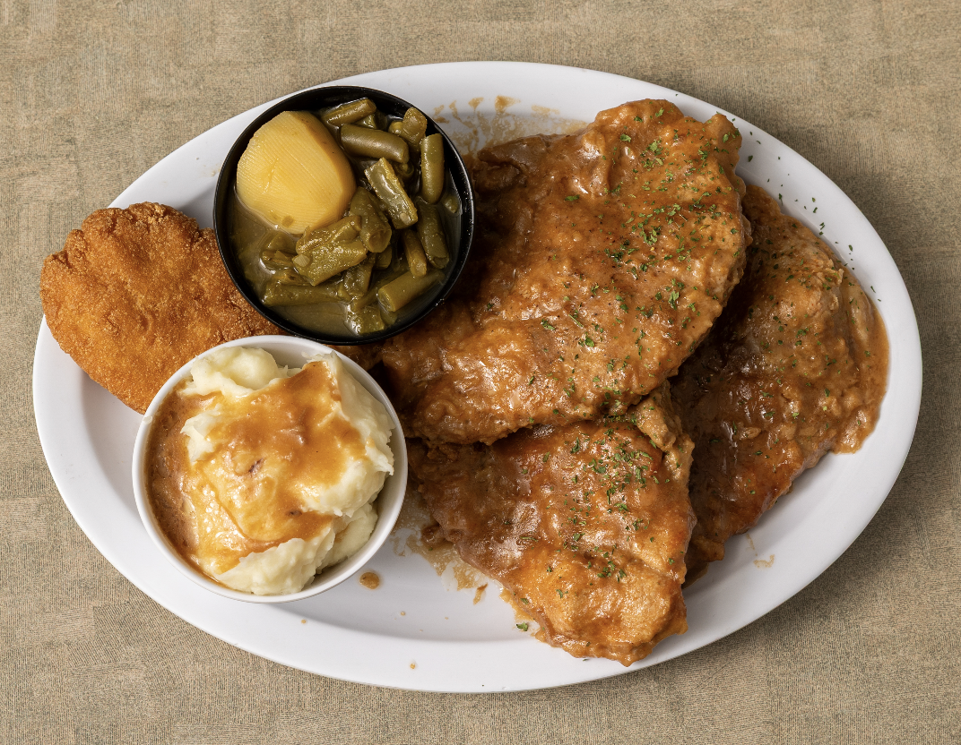 SM0THERED PORK CHOPS.