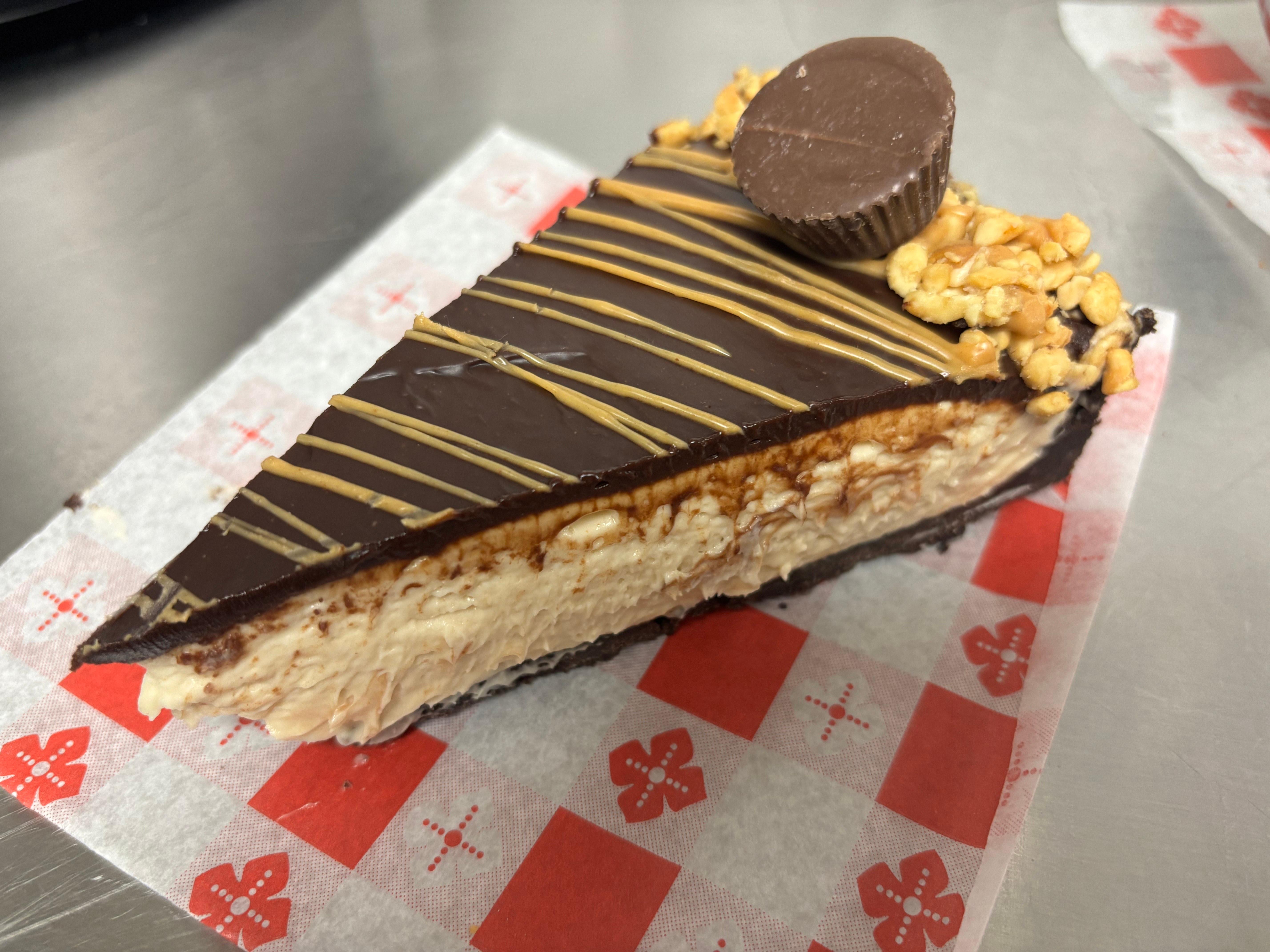 Peanut Butter Chocolate Ganache Cheesecake.