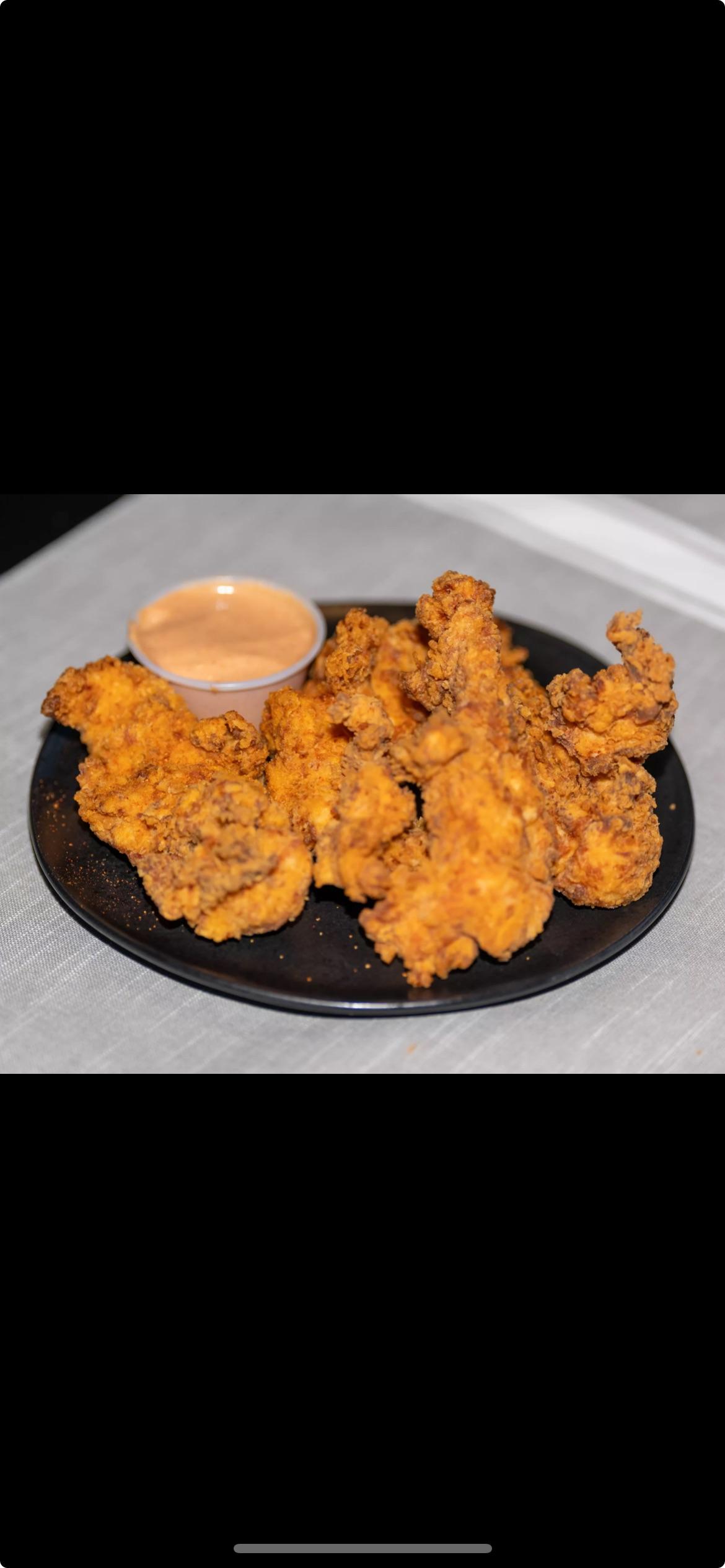 Four Chicken Tenders only with Ridiculous sauce.