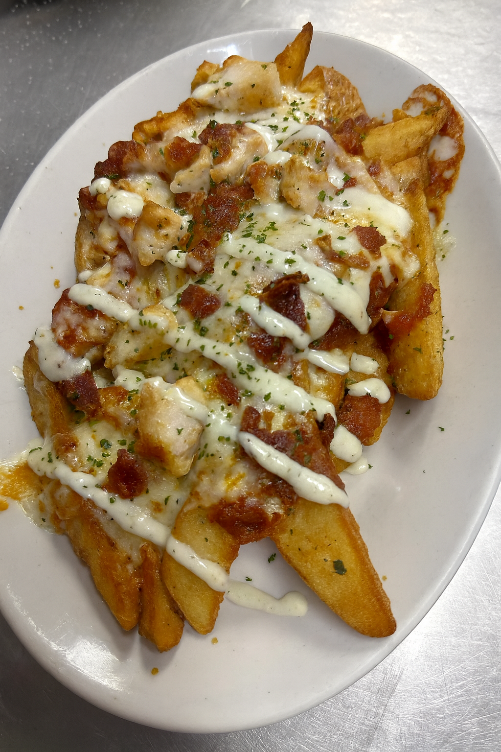 CHICKEN BACON RANCH WEDGE FRIES.