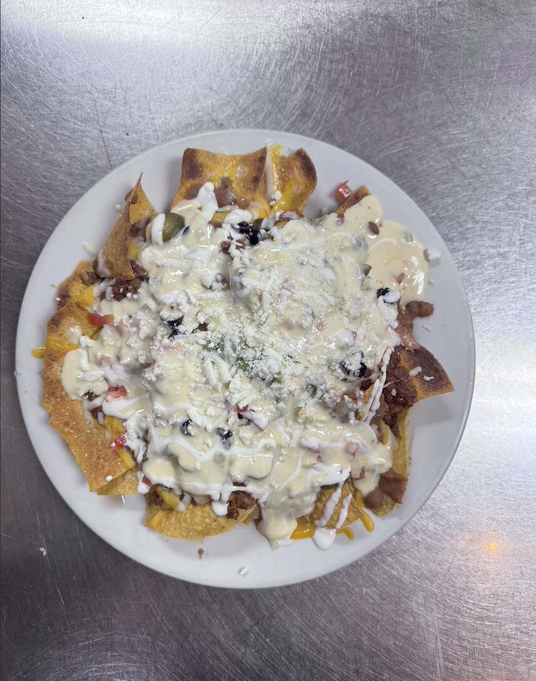 Jalapeno Cheese Dipped Nachos..