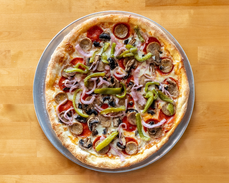 12" Extravaganza Pizza.
