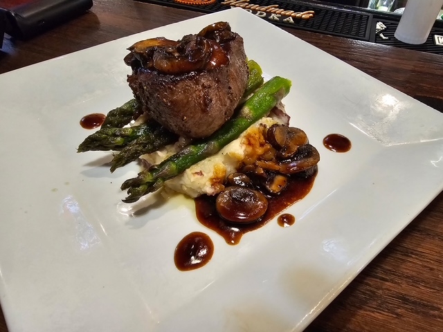 8 oz Baseball Cut Sirloin w/Garlic Mash, Grilled Asparagus, finished with Portabello Demi Glace.