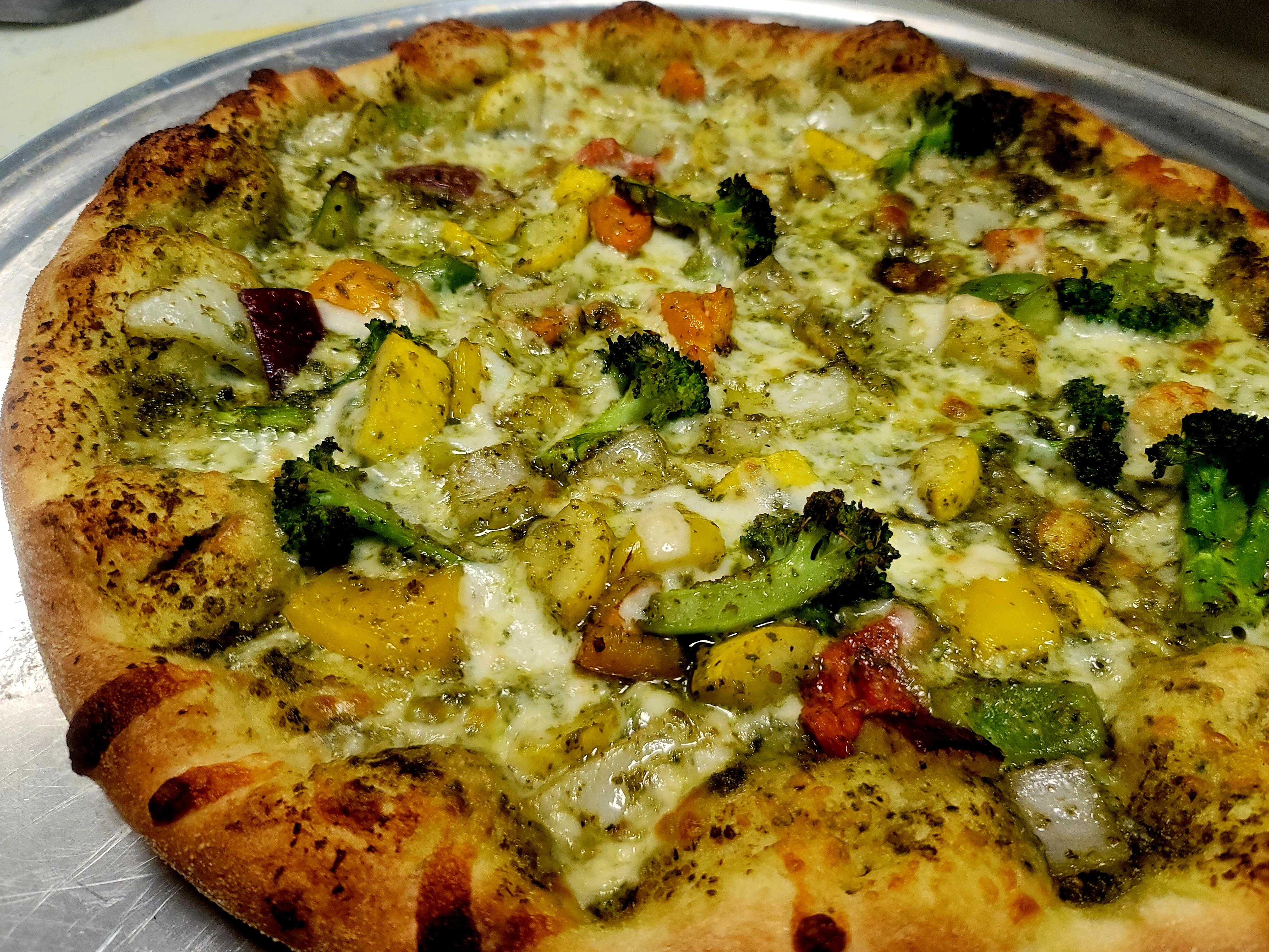 Paneer Veg Pesto Pizza.