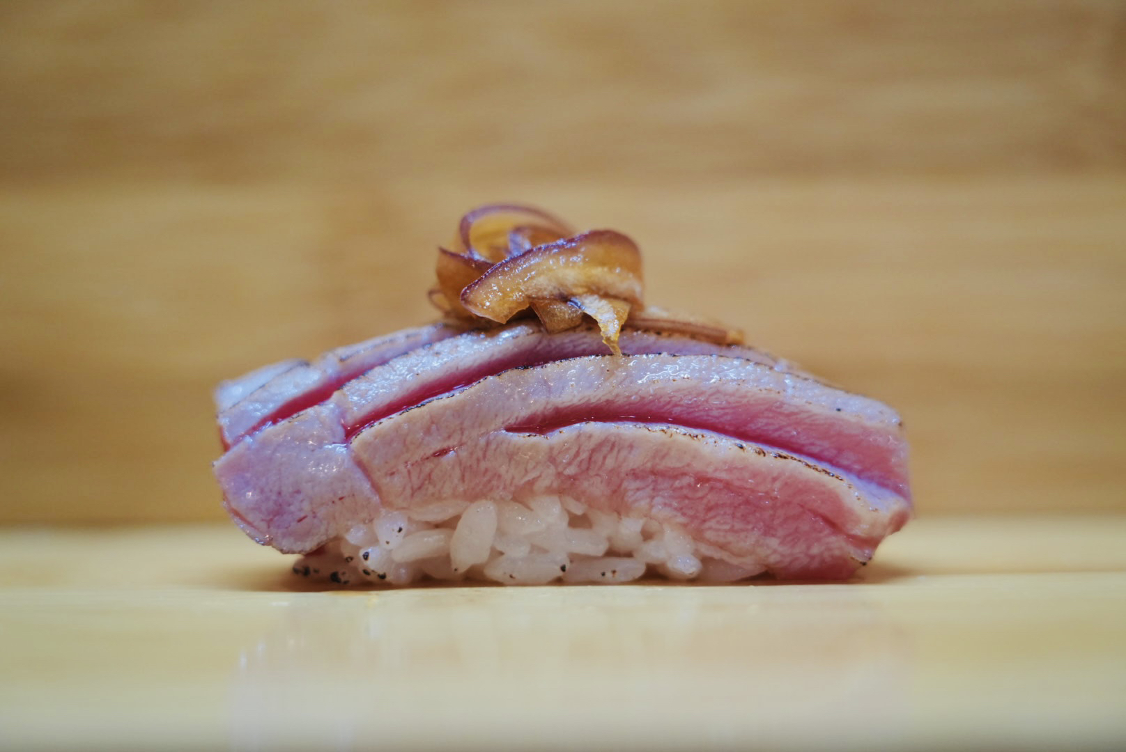 Seared Toro Carpaccio Sushi.