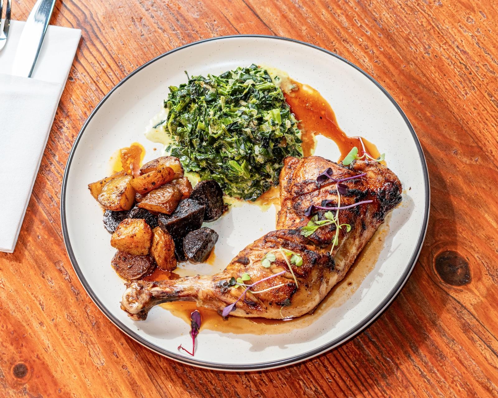 Half roasted chicken with a pomegranate glaze,.