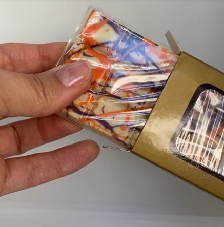 White Dubai Style Chocolate with Mango, Passion Fruit and Popping Chocolates.
