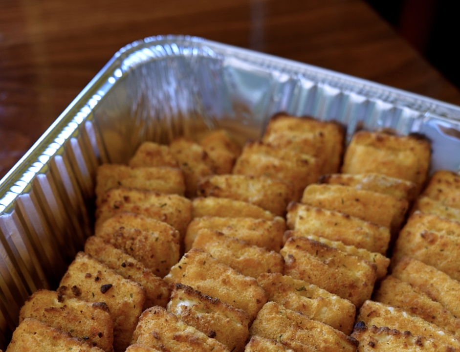Four-Cheese Breaded Ravioli served with Marinara.