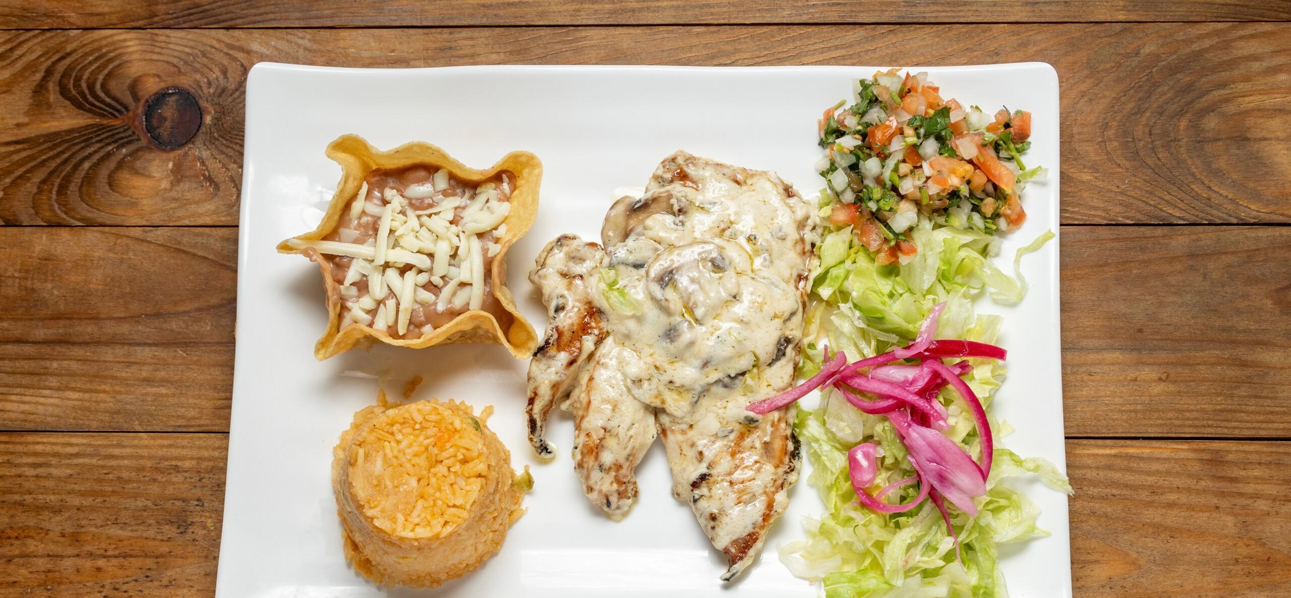Pollo con Champiñones.