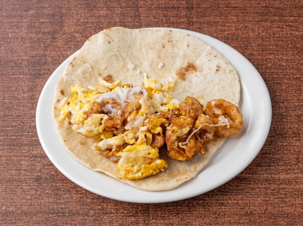 Chicharron crispy with egg taco.