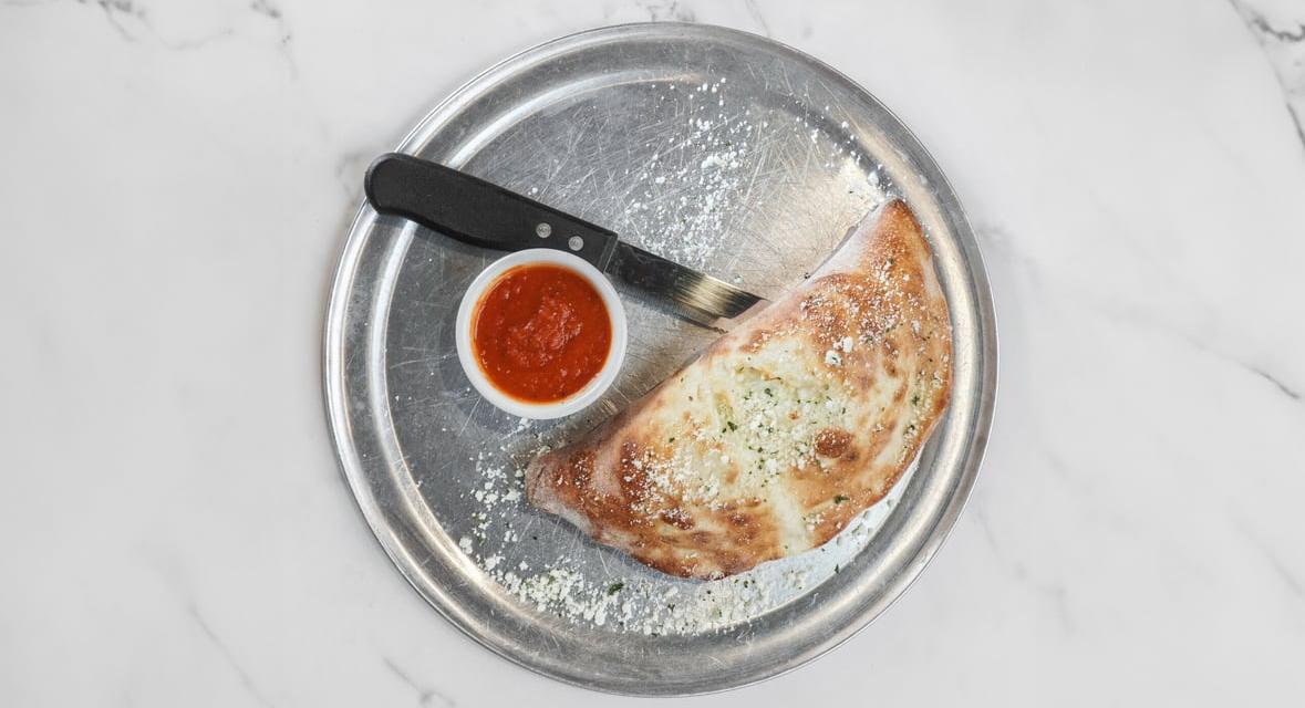 Spinach and Mushroom Calzone.